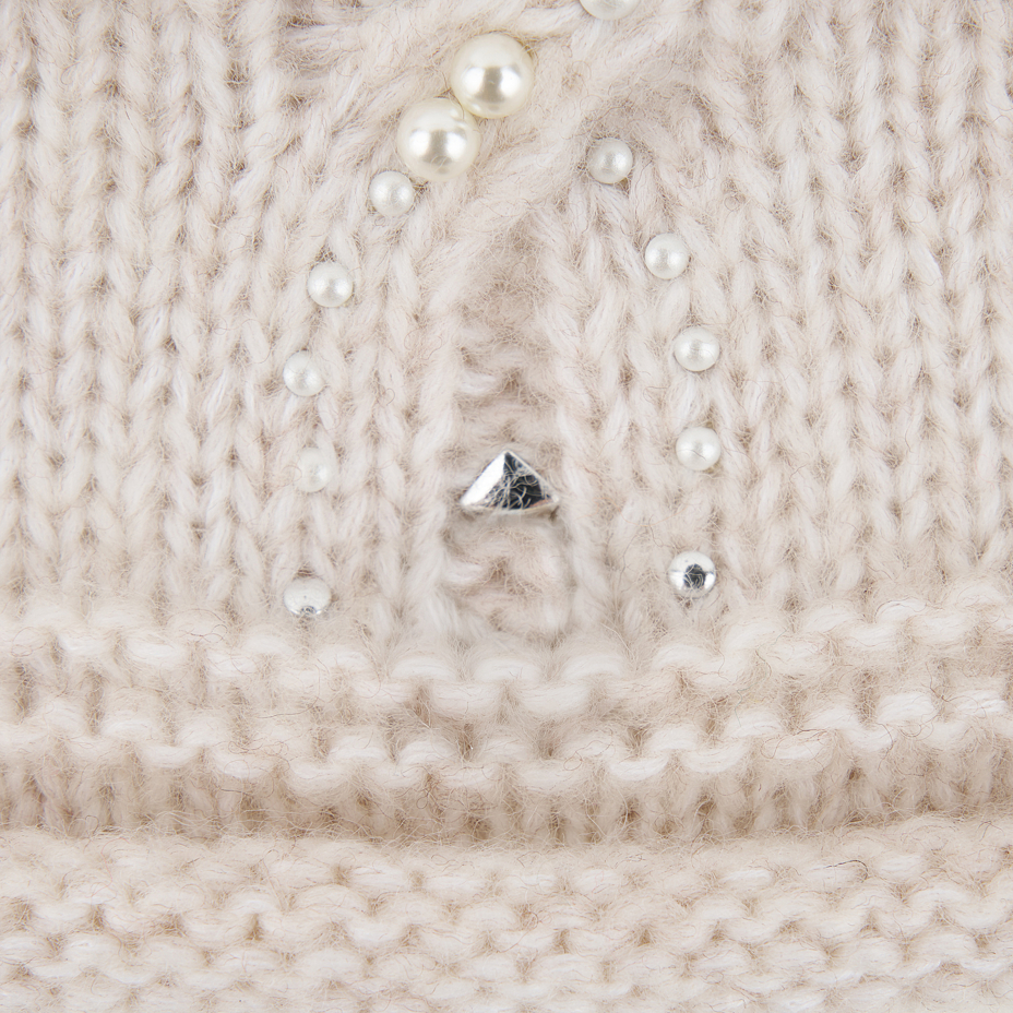 Merino wool cap with Nagoya natural decoration