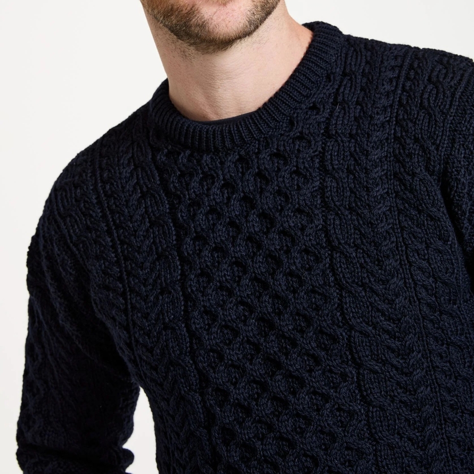 Men's Merino wool sweater with traditional pattern, dark blue