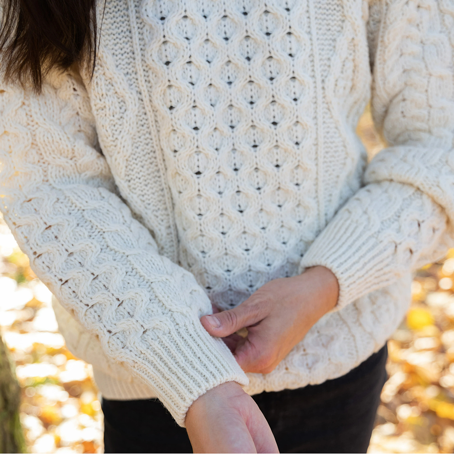 Women's wool sweater with round neckline, natural