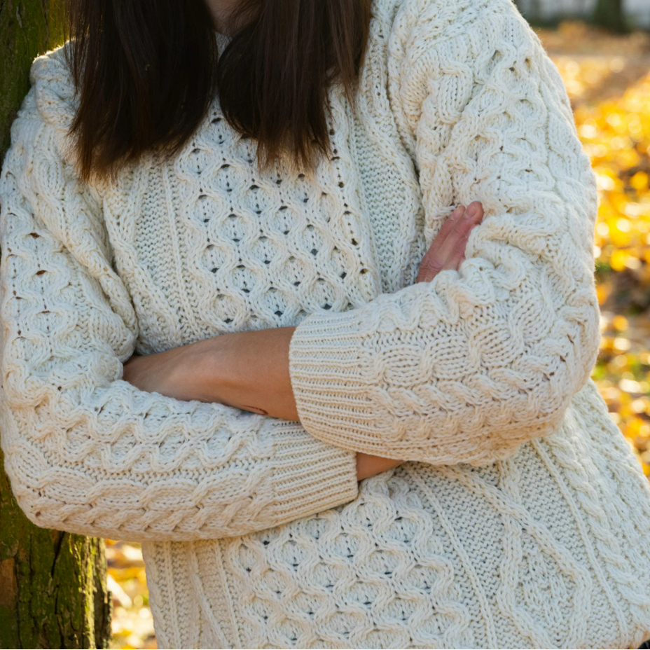 Women's wool sweater with round neckline, natural